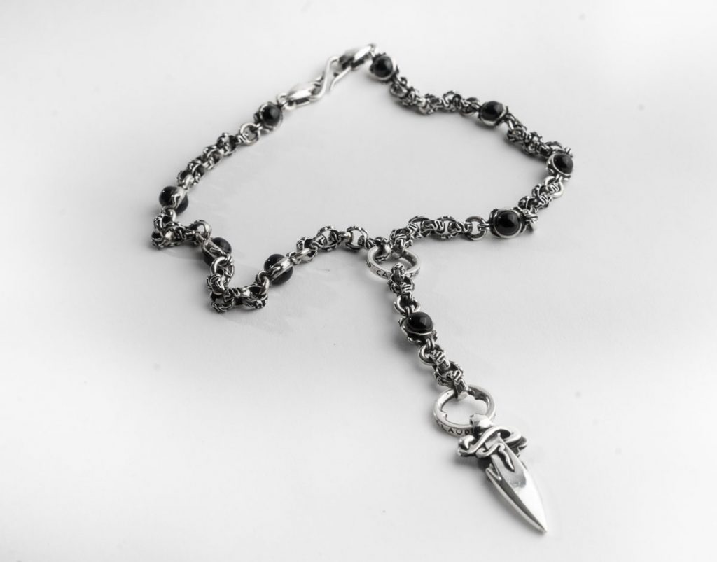Long necklace decorated rings CC187