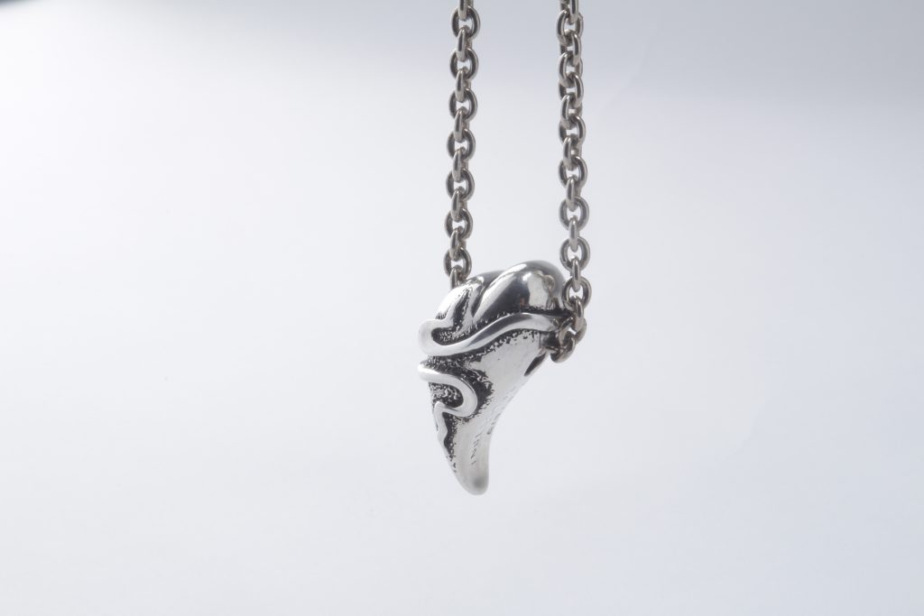 Silver pendant heart and snake
