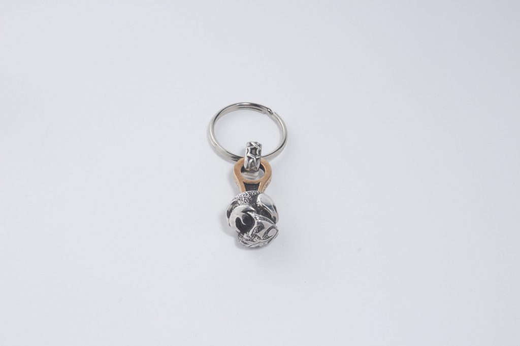 Silver and bronze keyring  with sphere