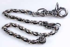 Silver wallet chain with arrow and snake
