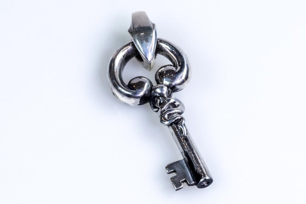 Silver pendant ancient key
